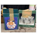 Santa candle cover and angel candle holder.