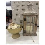 A rustic farmhouse lantern and Accent Decor Lita