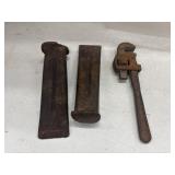 2 rusty iron tools are vintage wood splitting