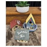 Hand crafted bird houses and artificial succulent.