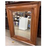 Antique pine wall mirror.
