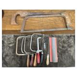 A collection features various hand tools,