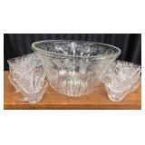 A vintage Indiana Glass punch bowl set features a