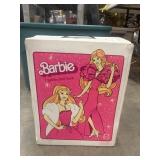 Vintage Barbie case with Barbies.