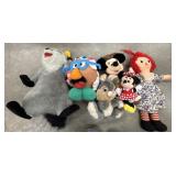 A bundle of Disney stuffed animal characters.