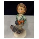 Goebel Hummel figurine titled 'Happy Traveler'