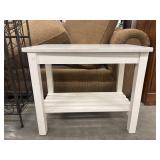 Ivy Bronx Bellamy end table features a white