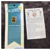 Abraham Lincoln collectors stamp pin and a