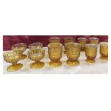Set of  Amber footed dessert and juice glasses.