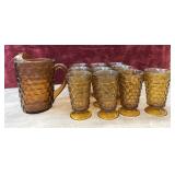 Amber pitcher and tea glass footed tumblers.