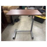 Poppin Series L Adjustable Height Desk.