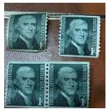 FOUR 1968 United States 1-cent postage stamps.