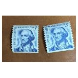 TWO 1966 5-cent George Washington stamps.
