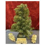 Miniature Christmas tree and ceramic trains.