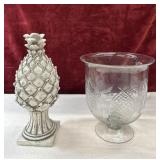 pineapple statuette and pineapple pedestal bowl.