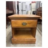 JTB brand wooden nightstand features a single