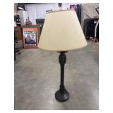 Vintage-style table lamp features a dark metal