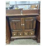 Dark antiqued pine cabinet by Ethan Allen
