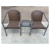 2 brown, stackable patio chairs features a woven