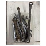 Bundle of wrenches, different sizes and brands.