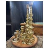 9 piece brass candlestick holders.