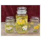Hildi" glass flower canister jars.