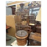 Vintage decorative floor bird cage features a