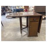 Vintage wooden drop-leaf table.