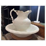 Antique white porcelain pitcher and basin set.