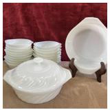 Fire-King milk glass bowls and casserole dishes.