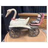 Reproduction cast iron pull toy, known as a