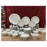 Noritake Fine China Set of 12 . 2 extra saucers.