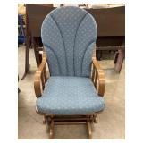 Classic wooden glider rocking chair.