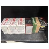Assortment of 12-gauge shotgun ammunition boxes