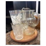 Vintage glass pitcher set likely features a