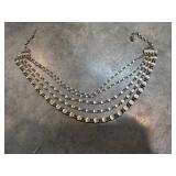 Vintage multi-strand silver-tone choker necklace.