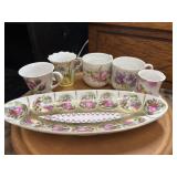 Antique, hand-painted porcelain teacups. Vintage
