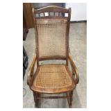 Antique Lincoln-style cane rocking chair.