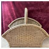 Hand woven rattan and wicker magazine rack.