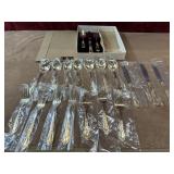 Oneida  gold ornate handle flatware. 8 spoons , 4