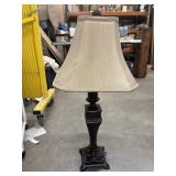 Traditional dark bronze table lamp.