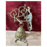 Antique  wall-mounted brass monastery bell.