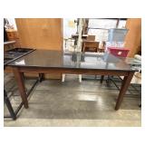 Mid-century modern wooden dining table.