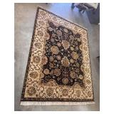 Handmade knotted traditional-style oriental area