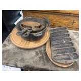nest of rusty, vintage cast iron cookware