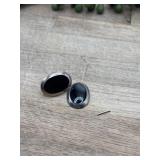 Vintage oval-cut black onyx gemstone set within a