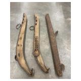 Antique wooden horse hame with attached cast-iron