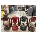 Kerosene hurricane lanterns. Missing globes.