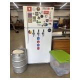 White top-freezer refrigerator that has been
