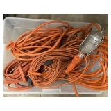 Coiled orange heavy-duty indoor/outdoor extension